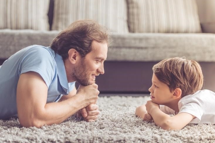 A father and son playing